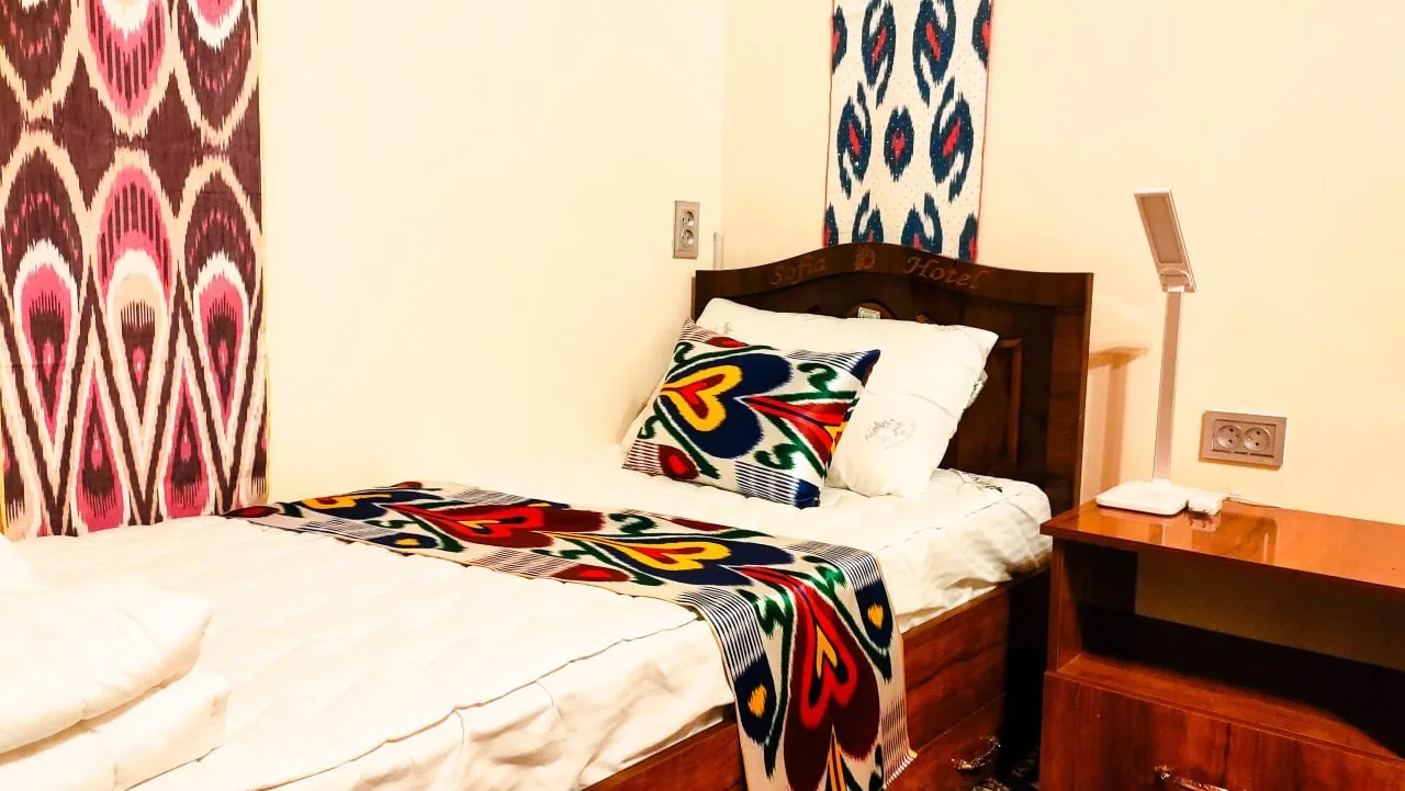 Bed with ikat runner