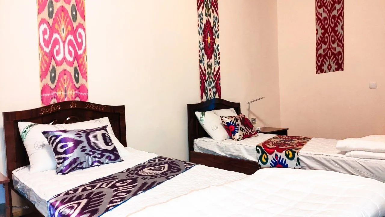 Shared room with three beds